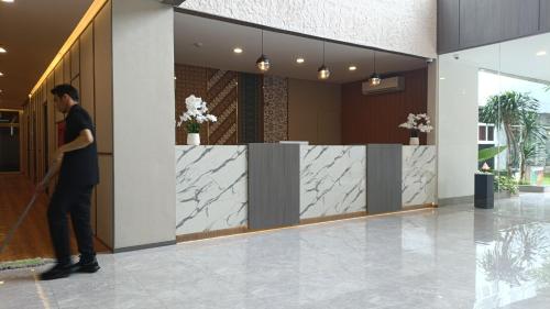 Ο χώρος του λόμπι ή της ρεσεψιόν στο Adia Suites Hotel