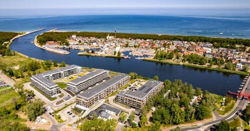 Apartament DZIWNA RIVER z frontowym widokiem na rzekę i basenem Dziwnów EPapartamenty