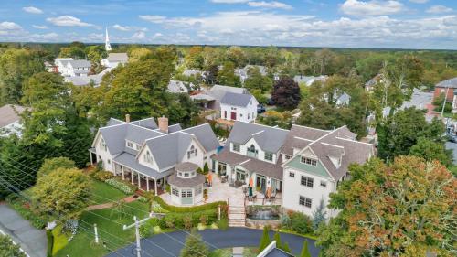 an aerial view of a large white house at The Winstead Inn in Harwich