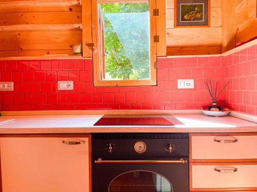 Η κουζίνα ή μικρή κουζίνα στο Le sorgenti - Chalet 12