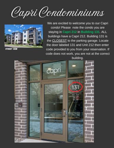 a sign in front of a revolving door at Capri Condo in Downtown Traverse City in Traverse City
