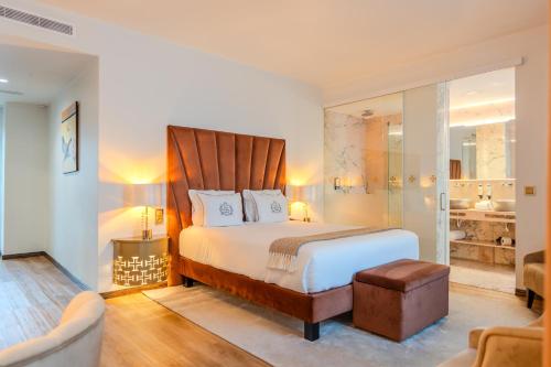 Cama ou camas em um quarto em Hotel República Boutique Hotel