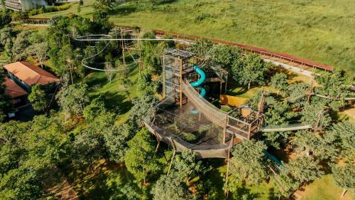 an overhead view of a water park with a roller coaster at Clara Ibiúna Resort in Ibiúna
