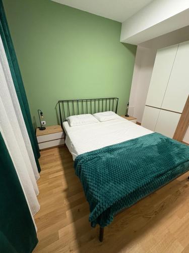 Postel nebo postele na pokoji v ubytování Apartment N02
