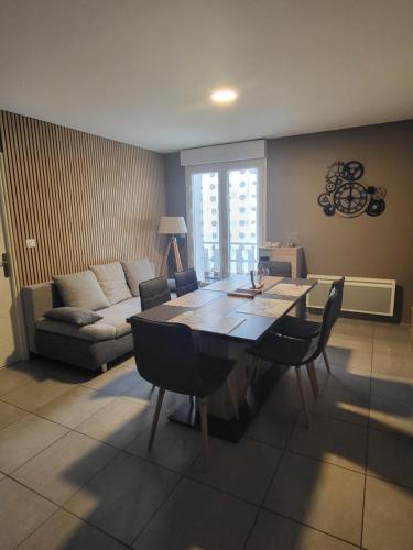 Un lugar para sentarse en LE TOURISTIC Appartements