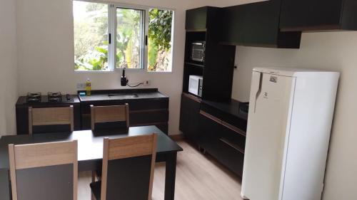Dapur atau dapur kecil di Cabana Moderna