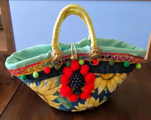 a handbag with a flower pattern on it at Casa Vacanze Villa Eolo in Agrigento