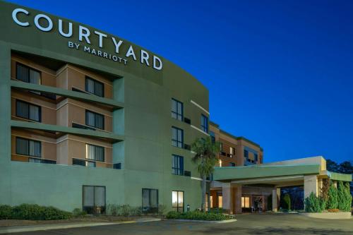 a rendering of a courtyard by marriott hotel at Courtyard by Marriott Jackson Airport/Pearl in Pearl