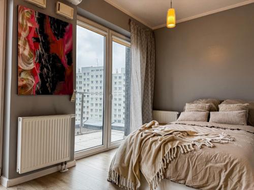 Ένα ή περισσότερα κρεβάτια σε δωμάτιο στο Great view, 5 minutes Rynek, UWr