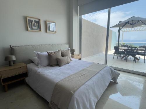 Postel nebo postele na pokoji v ubytování Luxury Beachfront Villa in Punta Mita