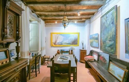 a dining room with a table and chairs at 3 Bedroom Nice Apartment In Stazzema in Stazzema