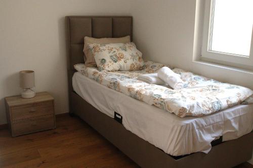 Postel nebo postele na pokoji v ubytování Melange Apartments