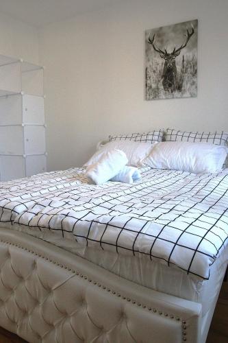 Postel nebo postele na pokoji v ubytování Melange Apartments