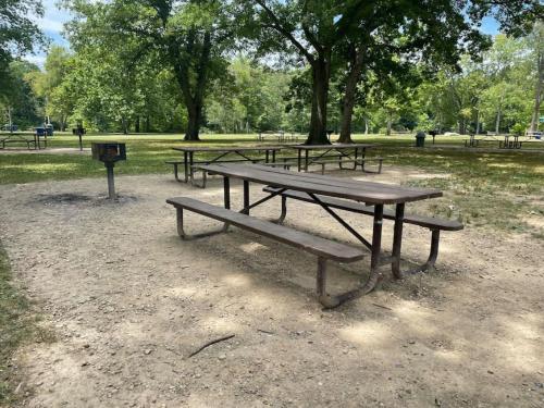 a group of picnic tables in a park at Large 4 Bedroom Home Close to Airport and IX Center in Berea