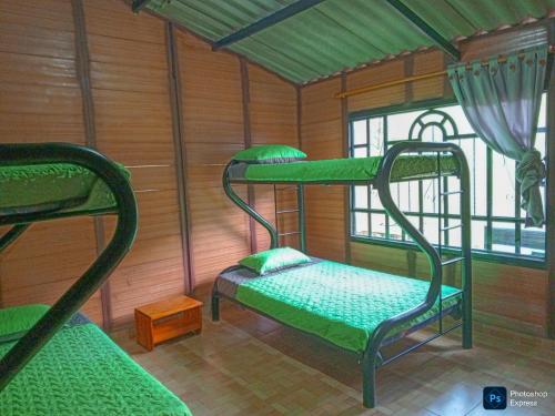 Postel nebo postele na pokoji v ubytování Cabaña Alto de Luna vifamiliar