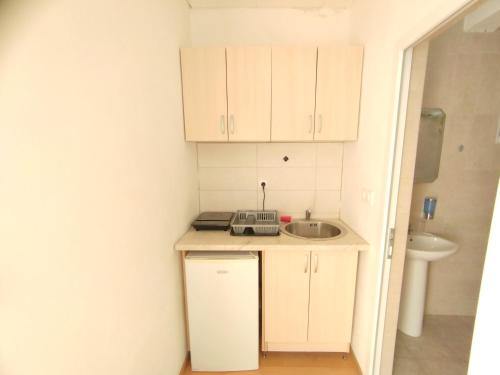 Kuchyň nebo kuchyňský kout v ubytování Apartments Sole