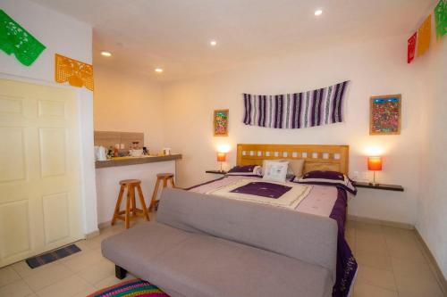 Ένα ή περισσότερα κρεβάτια σε δωμάτιο στο NUEVA Bamboo LA TEPOZTECA