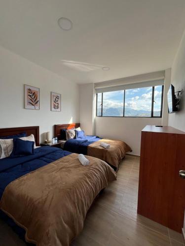 Postel nebo postele na pokoji v ubytování Casa Candelaria Hotel