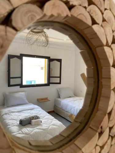 Postel nebo postele na pokoji v ubytování Titryte Surf House