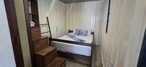 Ένα ή περισσότερα κρεβάτια σε δωμάτιο στο Containers Bacalar