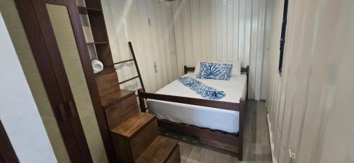 Ένα ή περισσότερα κρεβάτια σε δωμάτιο στο Containers Bacalar