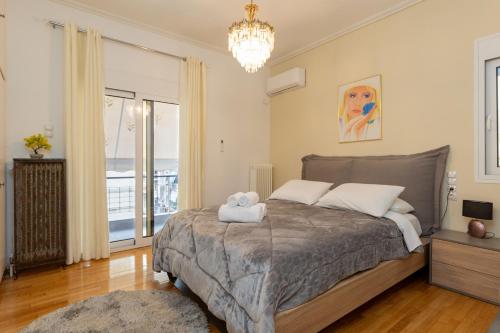 Una cama o camas en una habitación de Attiki - Appartment