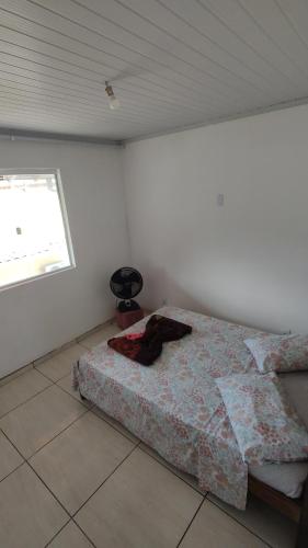 Ένα ή περισσότερα κρεβάτια σε δωμάτιο στο Casa 2 Quartos Paraty
