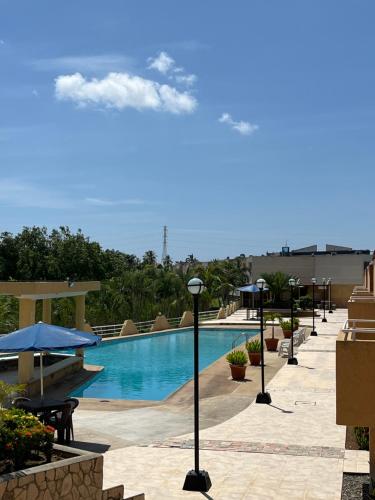 Bazén v ubytování Ciudad Flamingo Luxor B05 nebo v jeho okolí