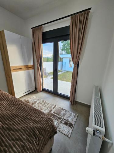 Postel nebo postele na pokoji v ubytování Drina Lux