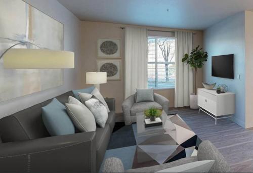 a living room with a couch and a chair at LALA House -1Br with Free Parking, Pool, Laundry in Los Angeles