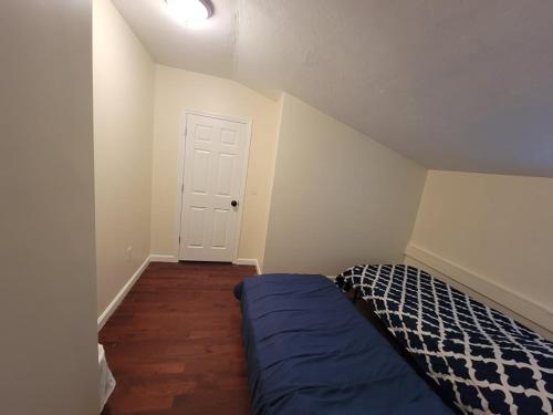 Un ou plusieurs lits dans un hébergement de l'établissement Esjacpe Guest House