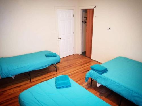 Un ou plusieurs lits dans un hébergement de l'établissement Esjacpe Guest House