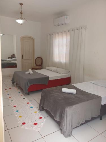 Katil atau katil-katil dalam bilik di Hotel Ceres Suíte Vida Nova - 15