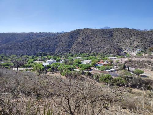 a small town in front of a mountain at Mahai in Cardonal