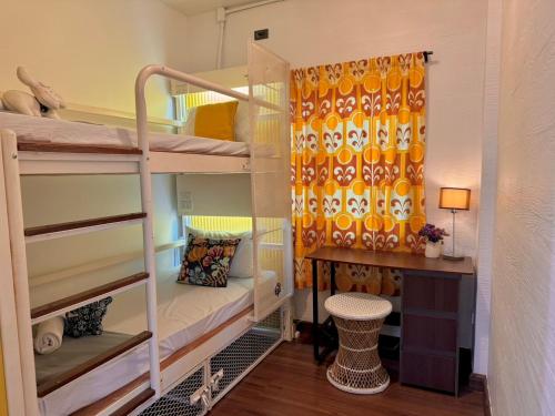 Postel nebo postele na pokoji v ubytování Chiza hostel Chiangmai