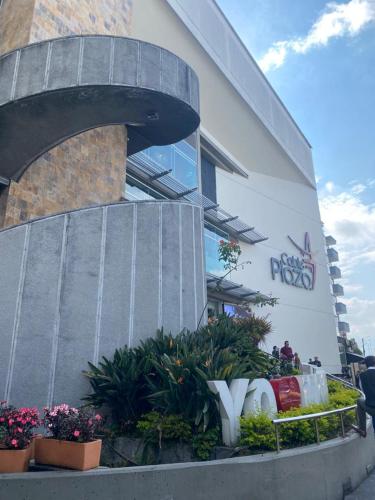 a building with a sign on the side of it at LA CASA DEL CABLE - Hermoso Apartamento - in Manizales
