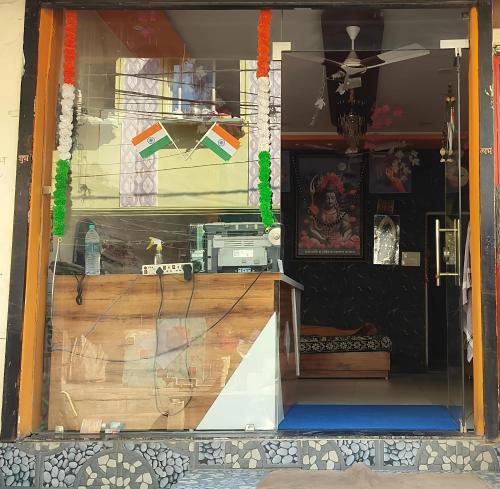 a store front with a display window of a store at Hotel Ganraj in Ujjain