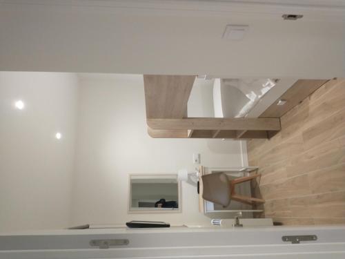 a bathroom with a sink and a mirror at Ponte do Burgo Primero in Pontevedra