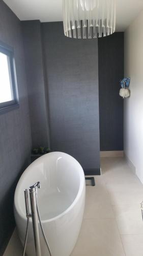 Et badeværelse på Maison 24H du Mans pour Chambres