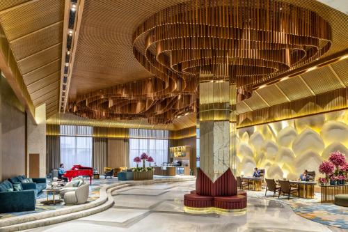 a rendering of the lobby of the trump international hotel casino at Taj Mussoorie Foothills, Dehradun in Dehradun