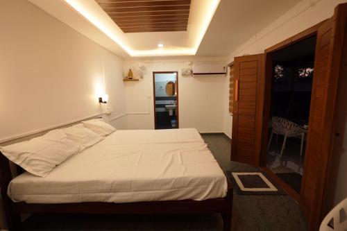 Ein Bett oder Betten in einem Zimmer der Unterkunft Maria Ocean View