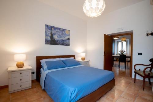 Ένα ή περισσότερα κρεβάτια σε δωμάτιο στο Wonderful in the historic center La Scoletta