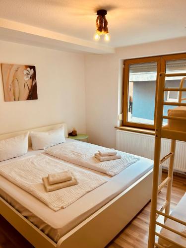 Letto o letti in una camera di Apartments Sunny Place
