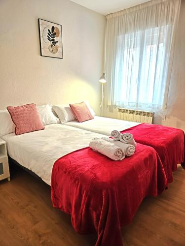 En eller flere senge i et værelse på Apartamento Logroño Ayuntamiento, centro y familiar