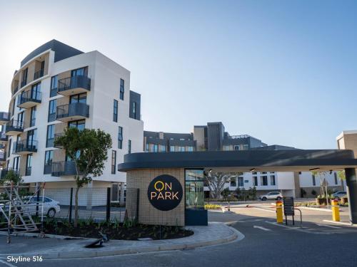 an onark sign in front of a building at On Park 516 At Century City in Cape Town