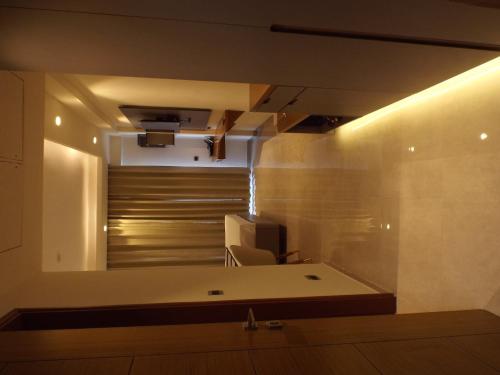 a bathroom with a sink and a mirror at Leisure Homes in Lucknow