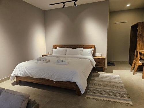 Postel nebo postele na pokoji v ubytování Hotel Blossom