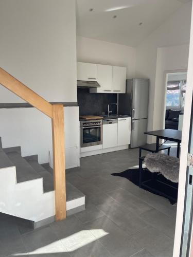 Η κουζίνα ή μικρή κουζίνα στο Apartment Panoramablick