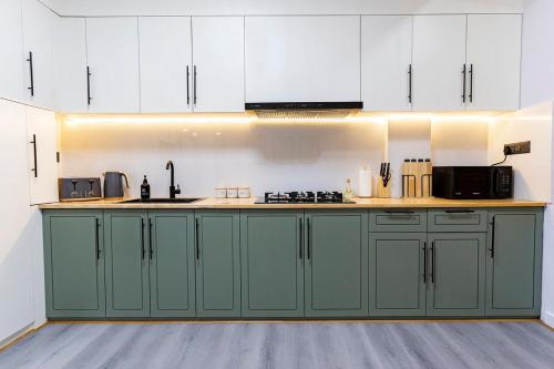 Η κουζίνα ή μικρή κουζίνα στο Modern 2BR Apartment in Kathmandu Putalisadak 4