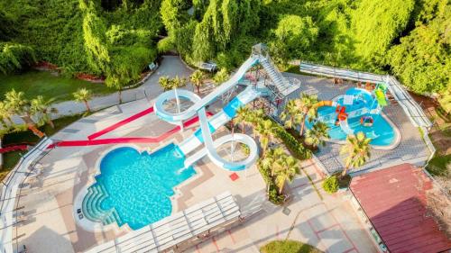 an overhead view of a pool at a resort at Lykia Botanika Beach Fun & Club - All Inclusive in Fethiye